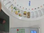 Automatic medication packaging machine